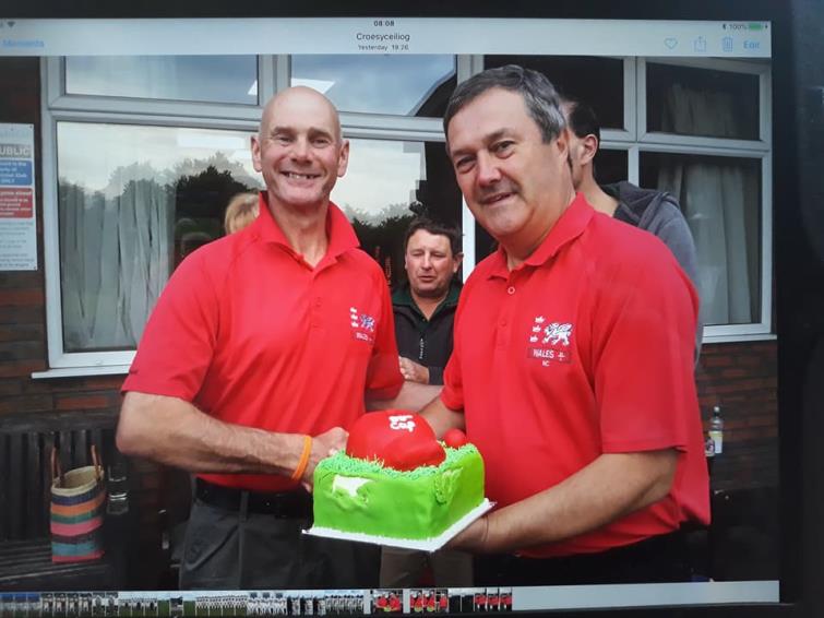 Paul Webb receives a cake